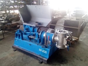 a blue machine with a large open lid - Pièces de Rechange